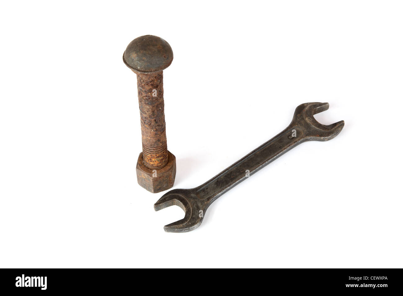 Wrench and rusty bolt with nut on a white background Stock Photo - Alamy