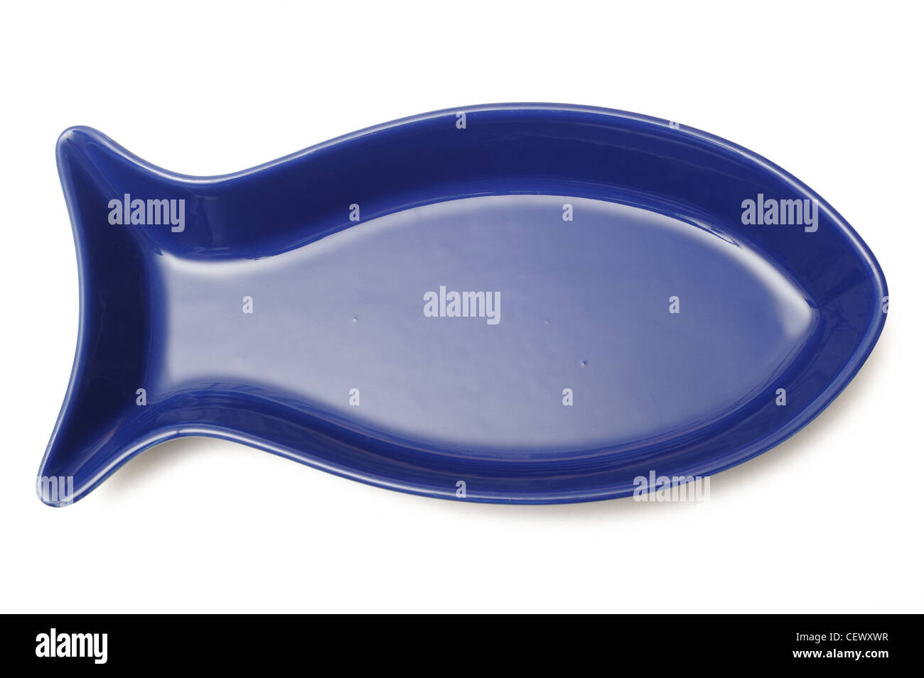 Photograph of a blue fish shaped food serving bowl Stock Photo