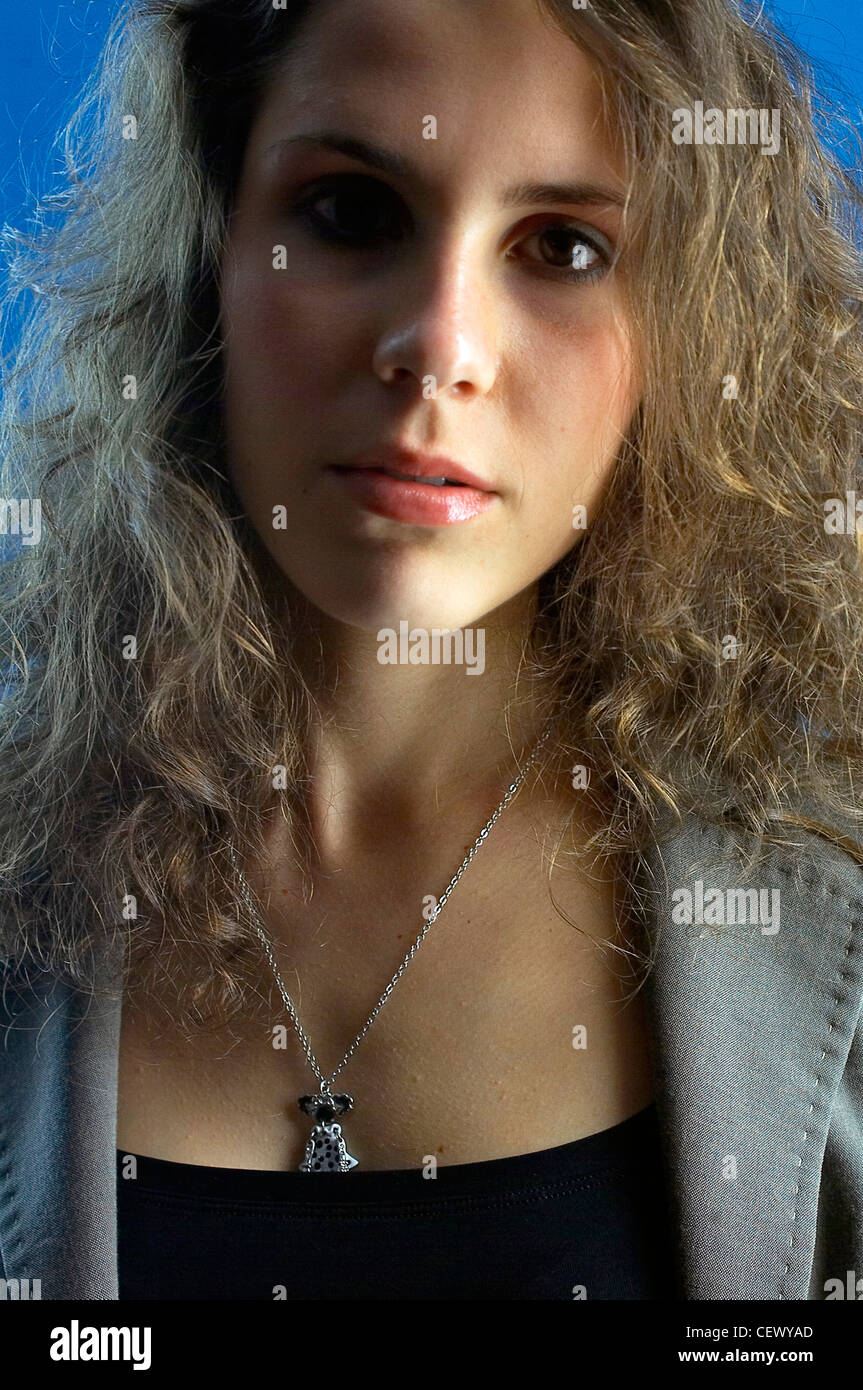 Curly brown hair brown eye hi-res stock photography and images - Alamy