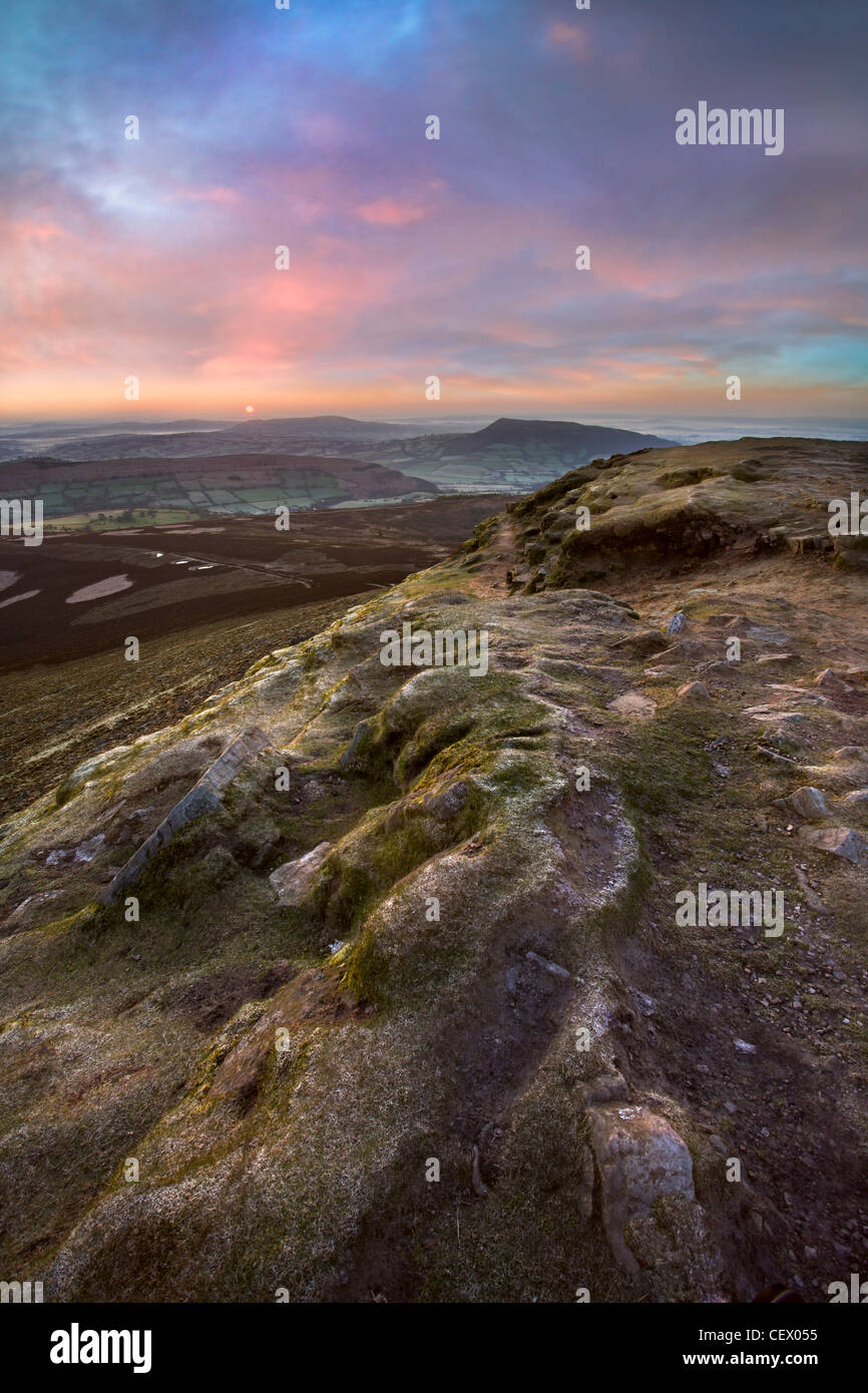 The Skirrid seen from the Sugar Loaf at dawn. Stock Photo