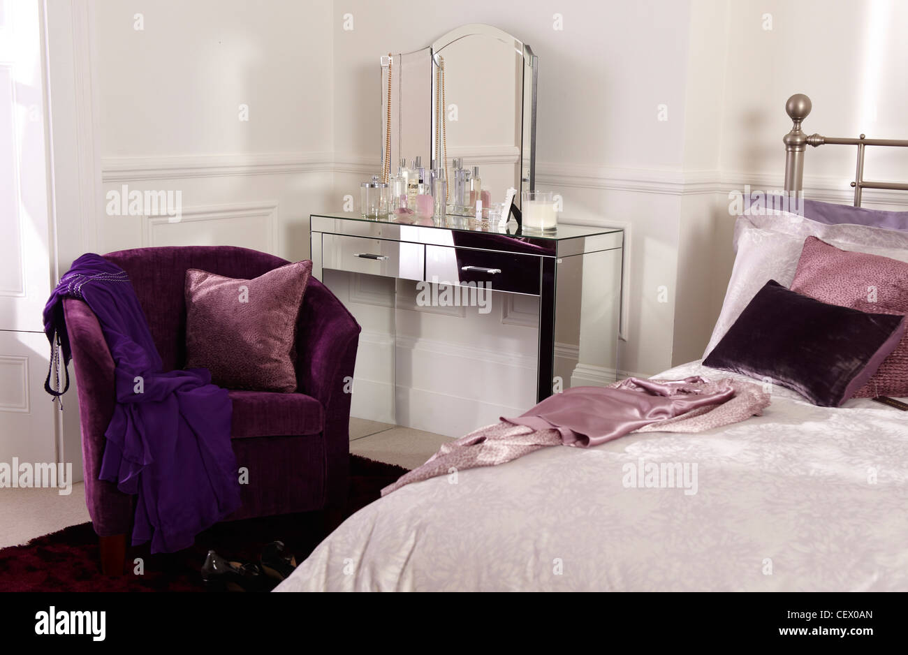 Bedroom interior with purple tones Stock Photo
