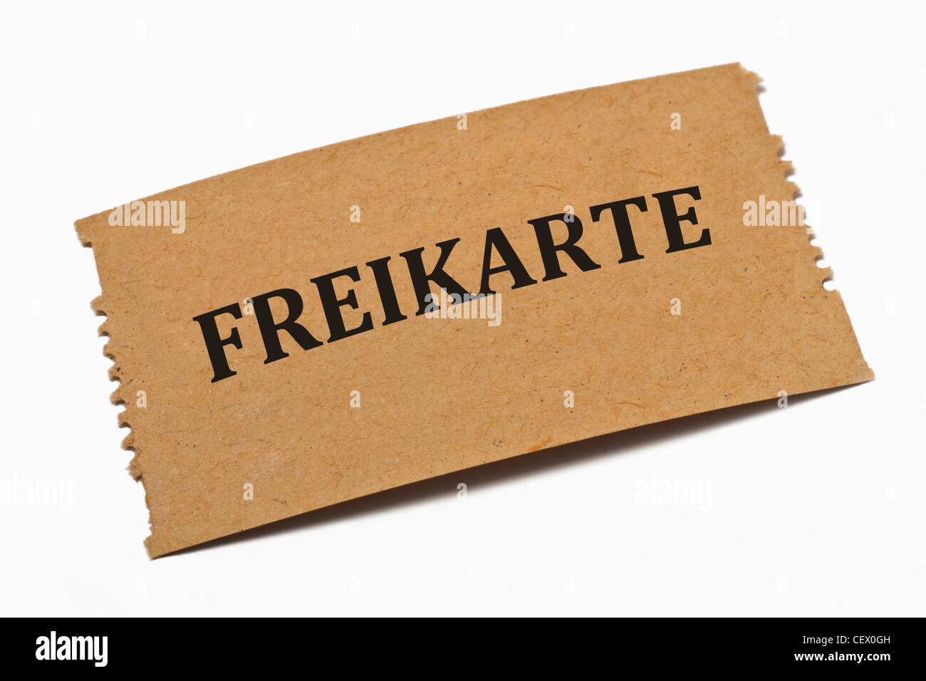 Detailansicht einer Karte aus Papier mit der Aufschrift Freikarte | Detail photo of a paper card with the inscription Freikarte Stock Photo