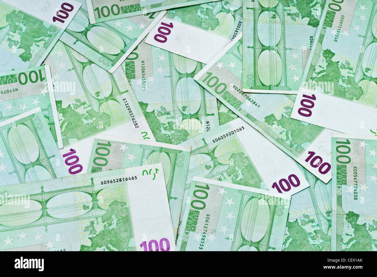 Many 100 Euro Banknotes are next to each other. On January 01st 2002 the Euro was introduced as cash. Stock Photo