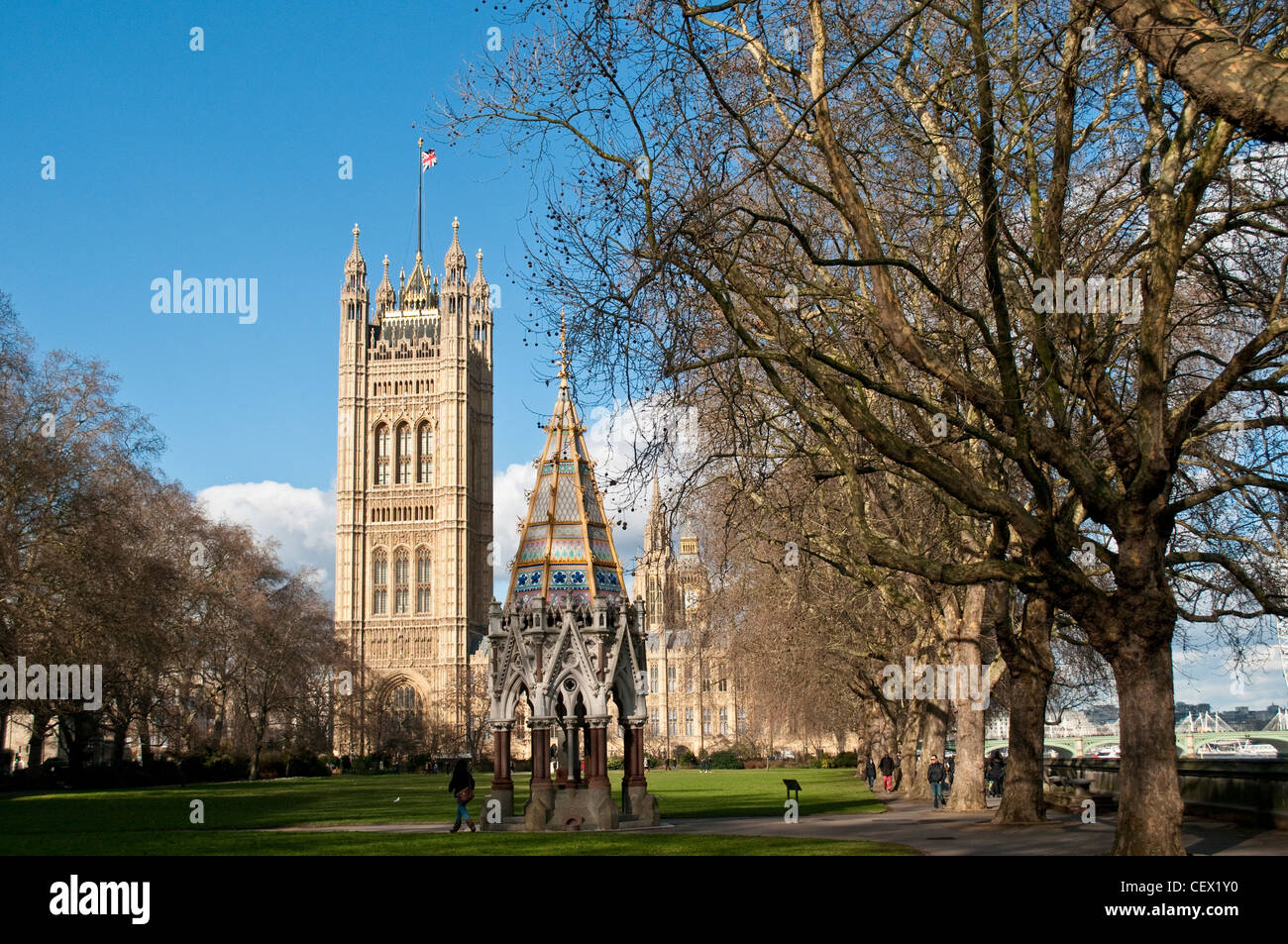 Buxton Memorial Fountain in Victoria Tower Gardens, Houses of Parliament with Victoria Tower, London, UK Stock Photo