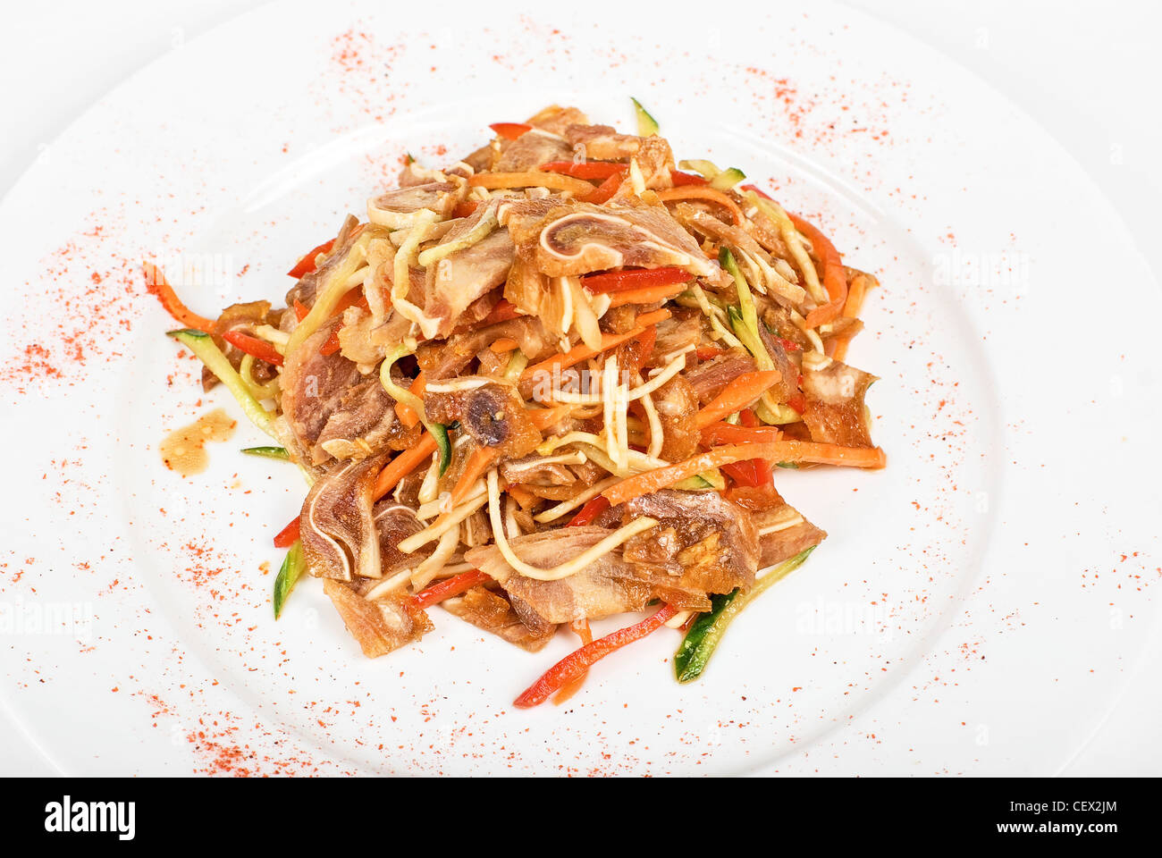 Salad with pig ear with celery, carrot, pepper, cucumber and garlic