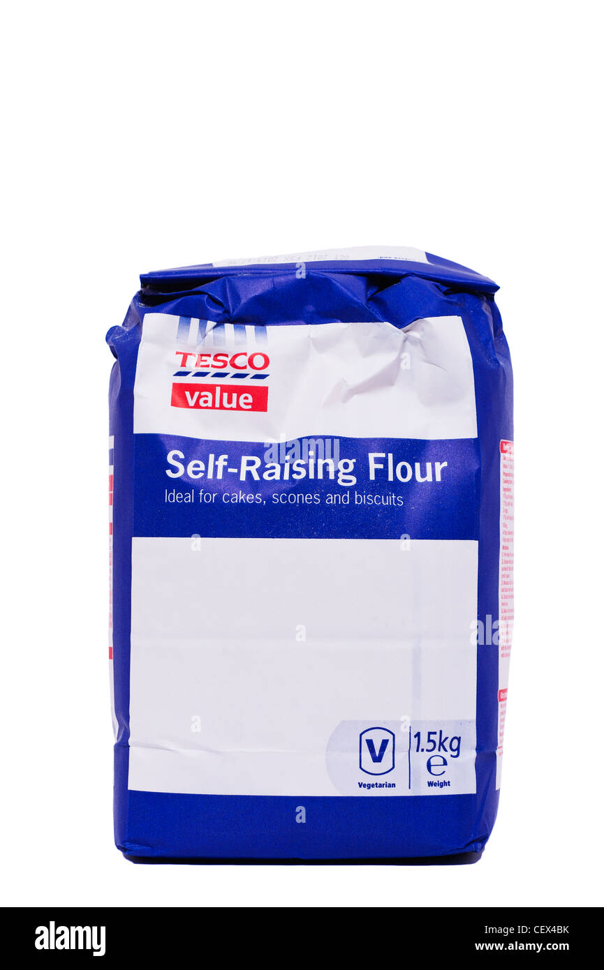 A packet of Tesco value self-raising flour on a white background Stock Photo