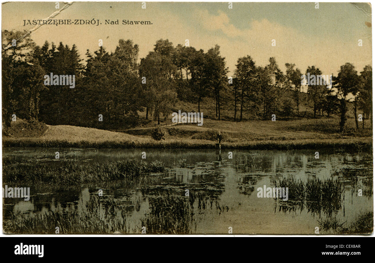 POLAND - CIRCA 1929: Antique postcard printed in Polland shows Jastrzbie-Zdroj, over pond, circa 1929 Stock Photo