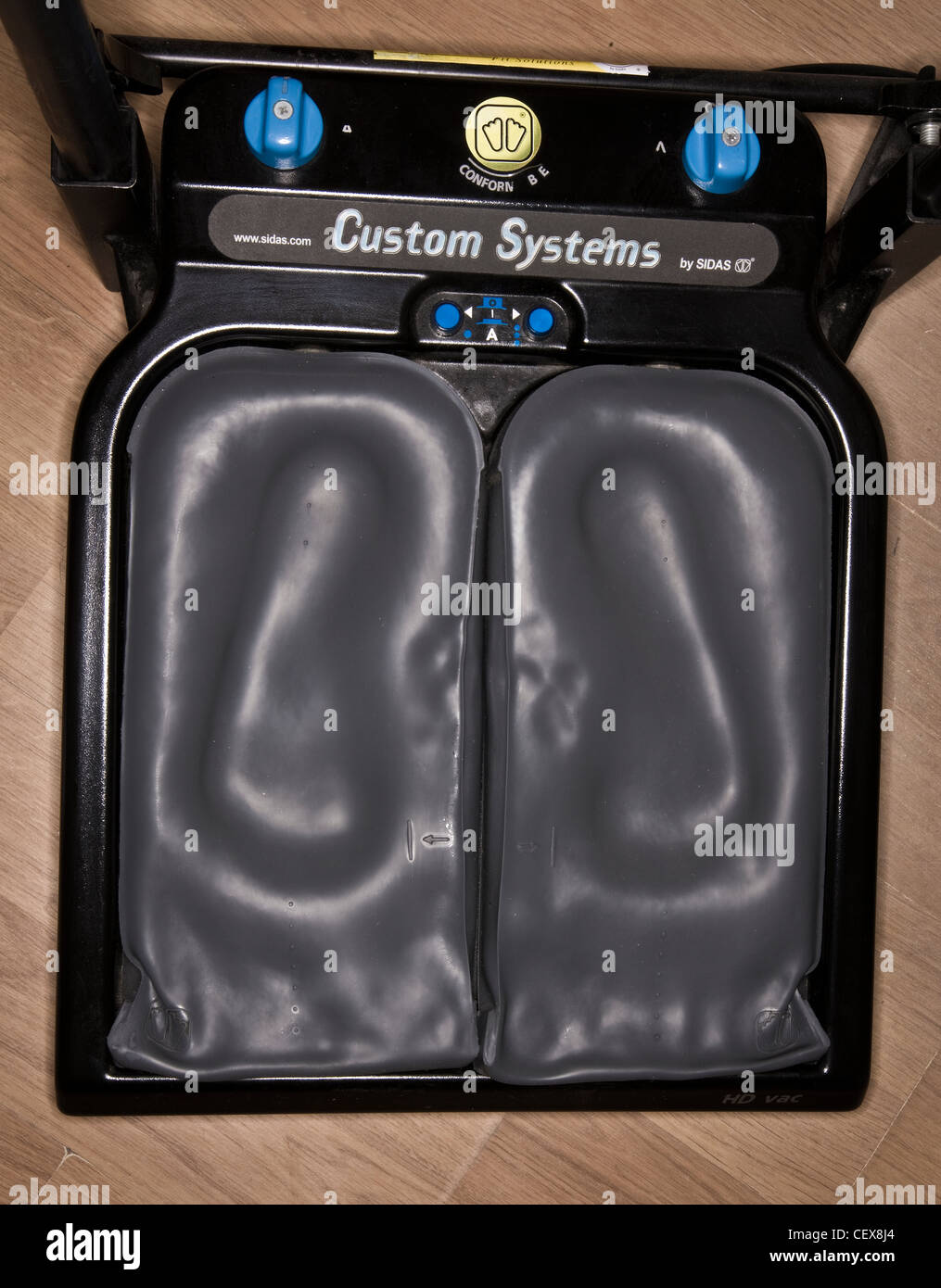 Custom sports shoe fitting machine Stock Photo Alamy