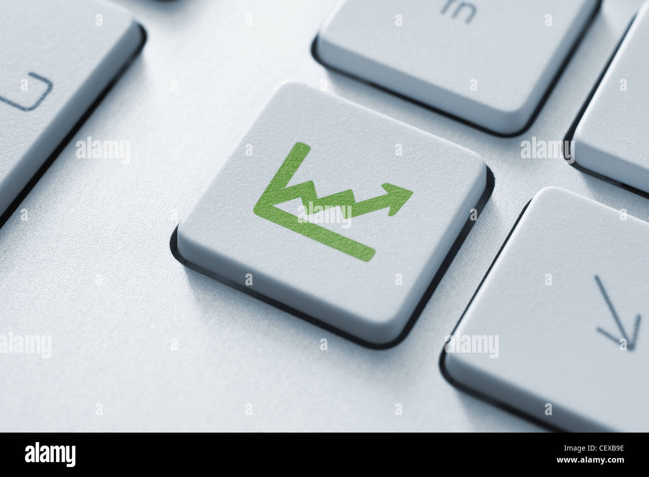 Investment button on the keyboard. Toned Image. Stock Photo