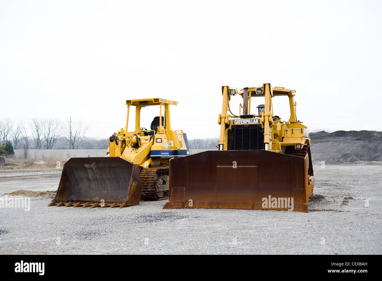 Two Bulldozers sitting at a construction site Stock Photo
