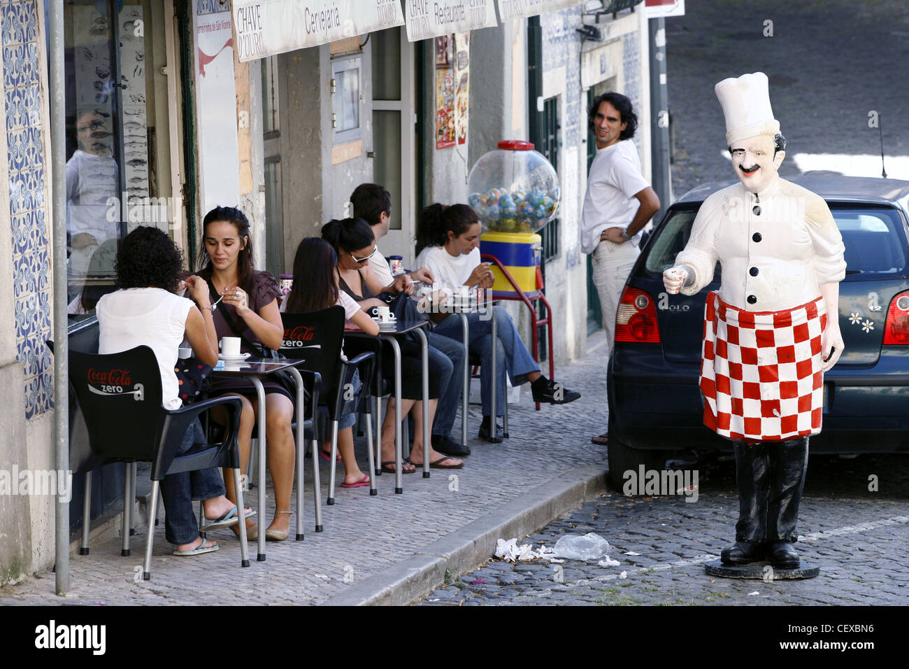 Street café in Alfama, Lisbon, Portugal Stock Photo