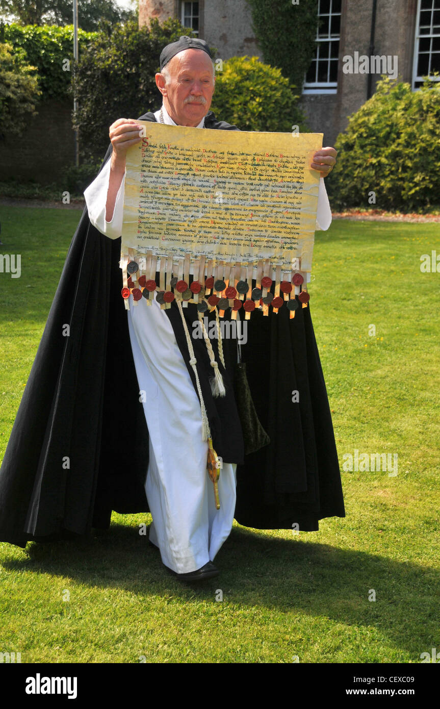 A copy of the the Declaration of Arbroath, The Statement of Scots Nationhood - 1320 - re enactment group member. Stock Photo