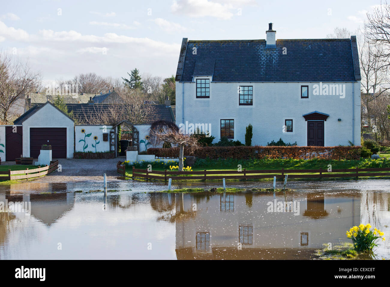 Flood water from River Spey surrounds property in Garmouth, Scotland in April 2010 due to heavy snow melt. Stock Photo
