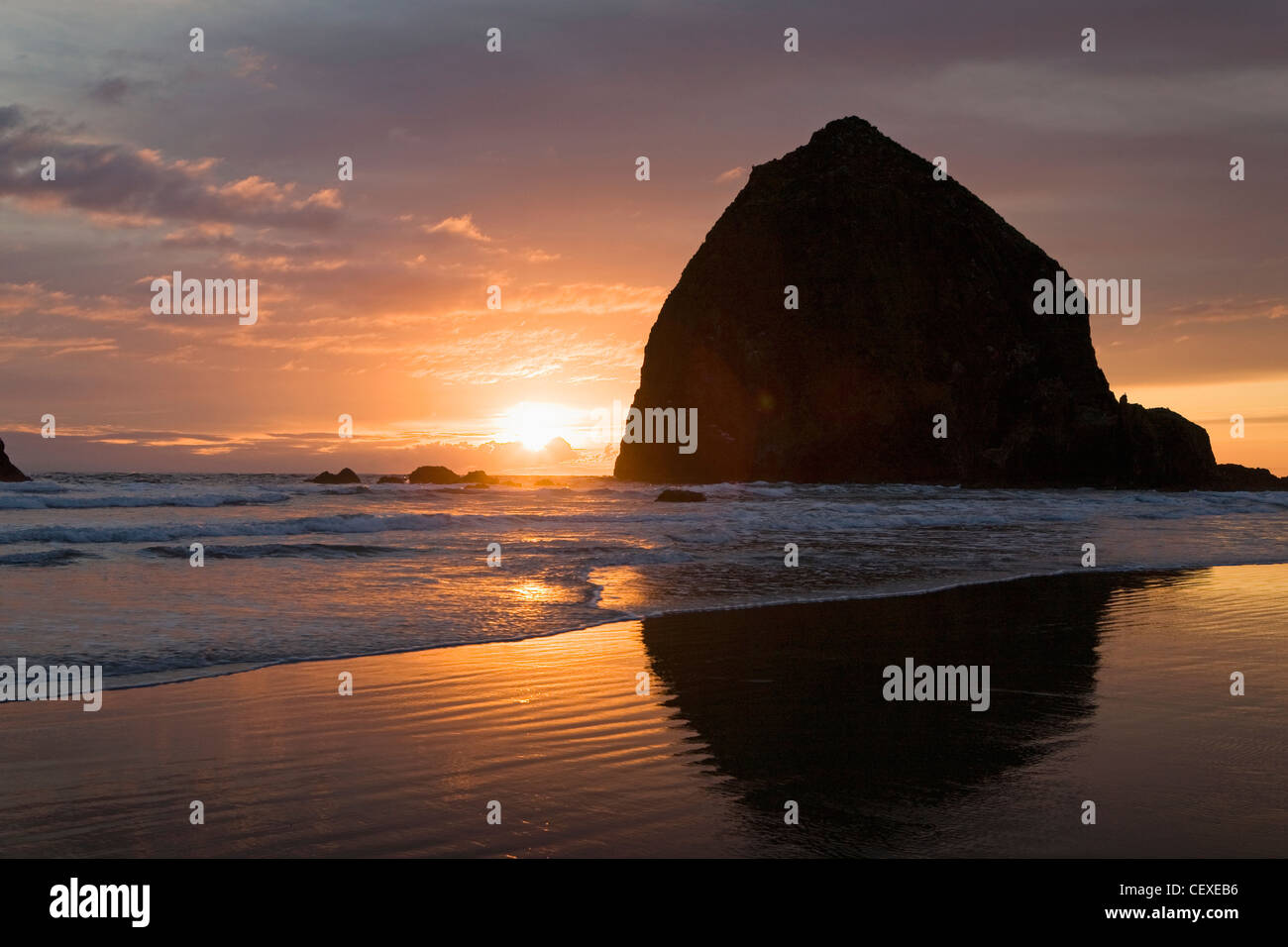 silhouette of haystack rock at sunset; cannon beach, oregon, united states of america Stock Photo