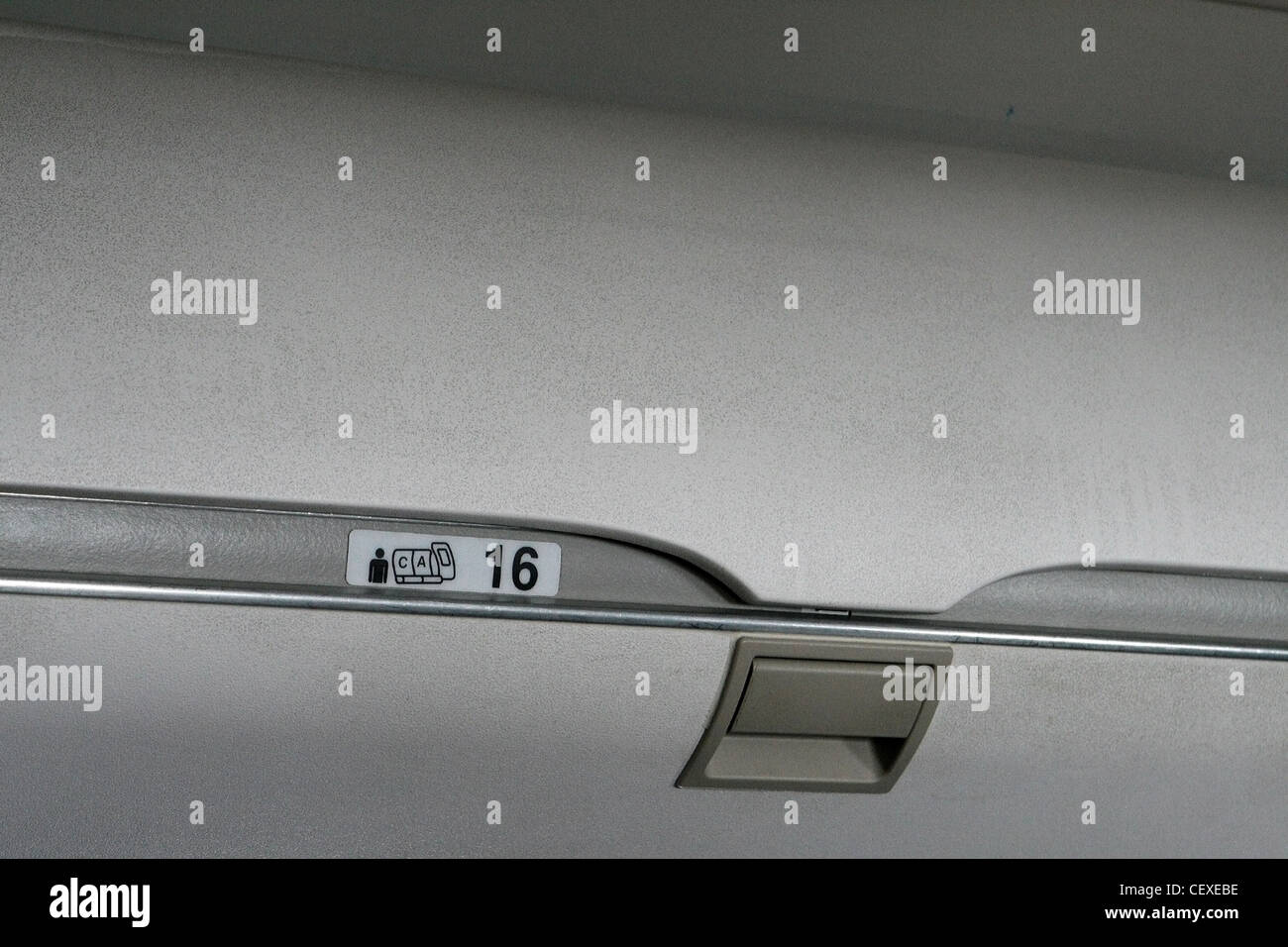 Luggage compartment in an airliner Stock Photo