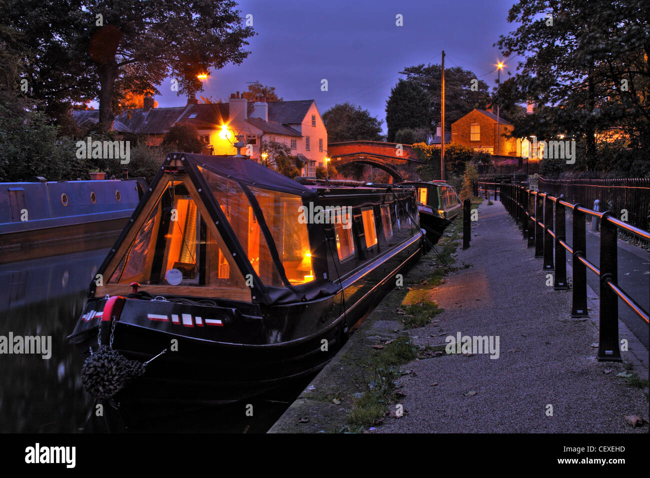 Bridgewater canal Lymm Village moorings, Warrington Cheshire, England, UK at Dusk Stock Photo