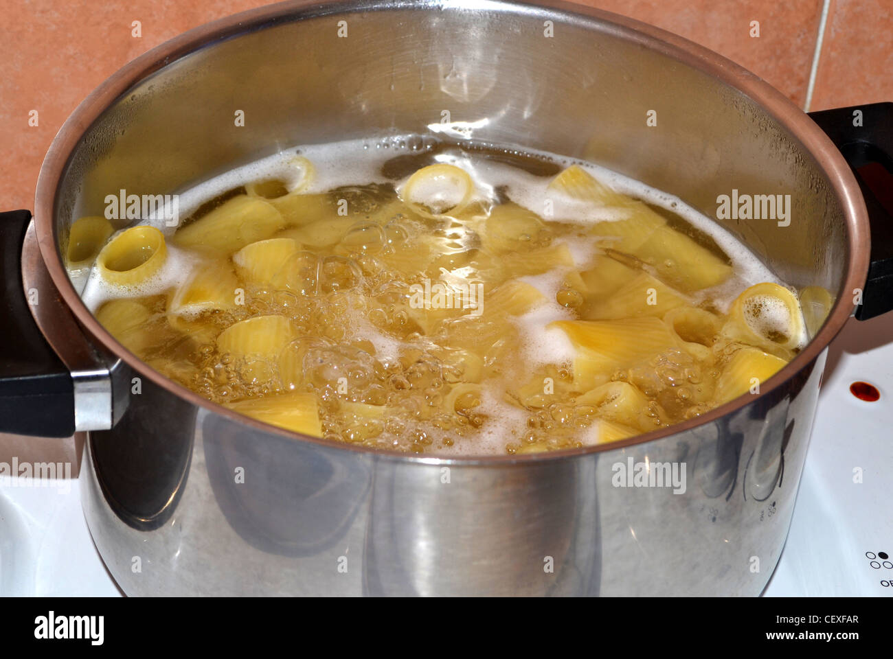 Pasta boiling in pot Stock Photo Alamy