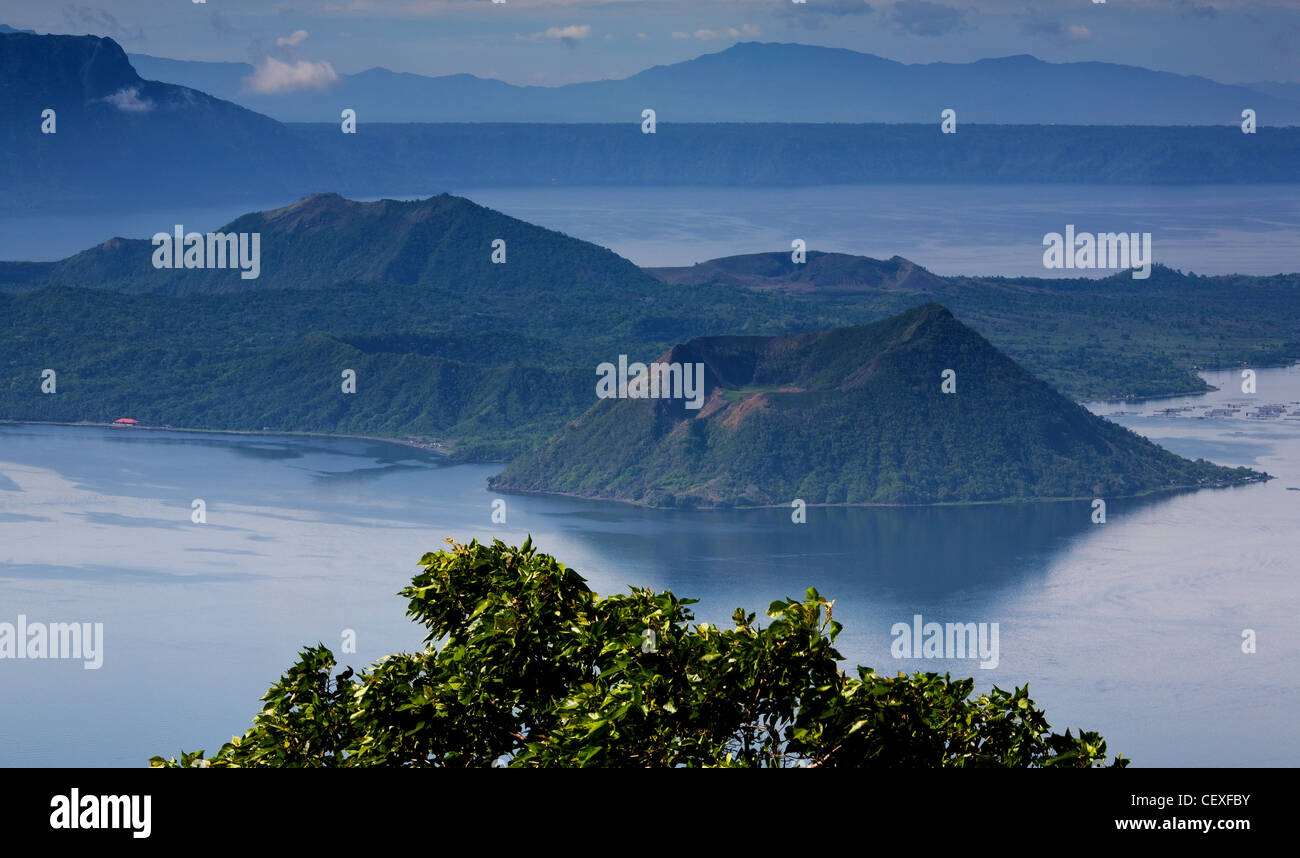 Volcano Island sits in the clear blue waters of Taal Lake in Cavite Province, Philippine Islands. Stock Photo