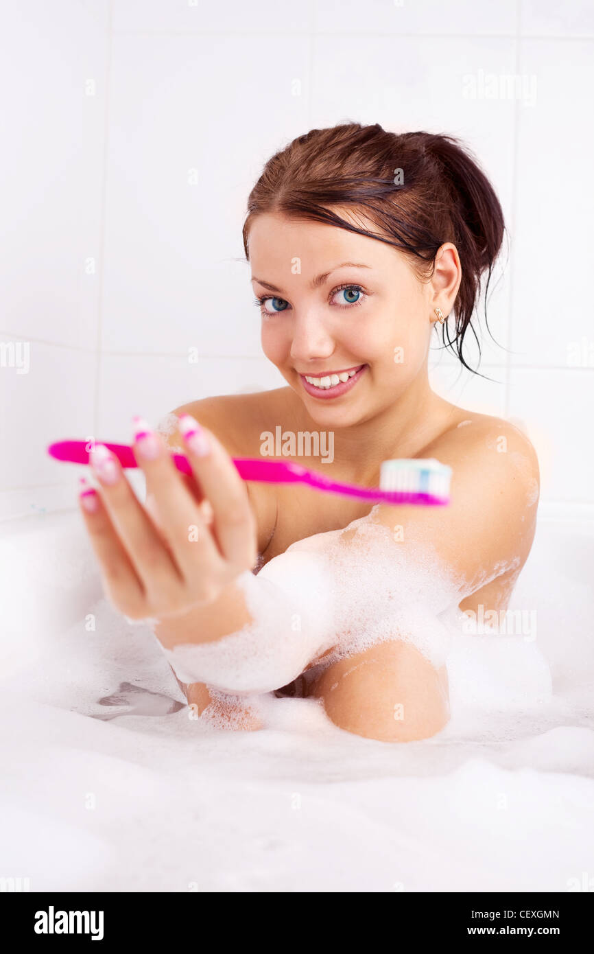 beautiful young woman taking a bath with foam Stock Photo Alamy