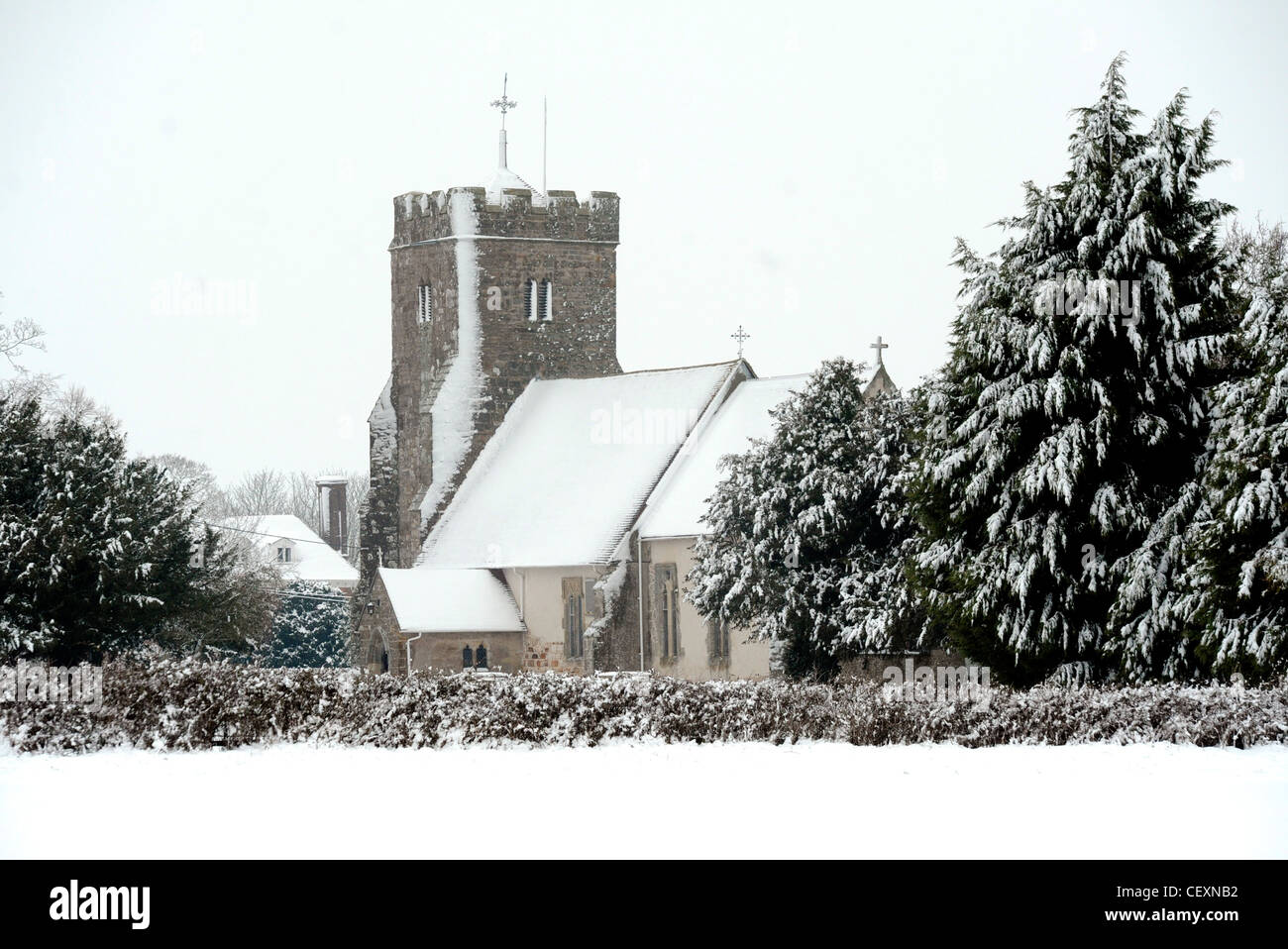 Snow covered church at Ripe East Sussex Stock Photo