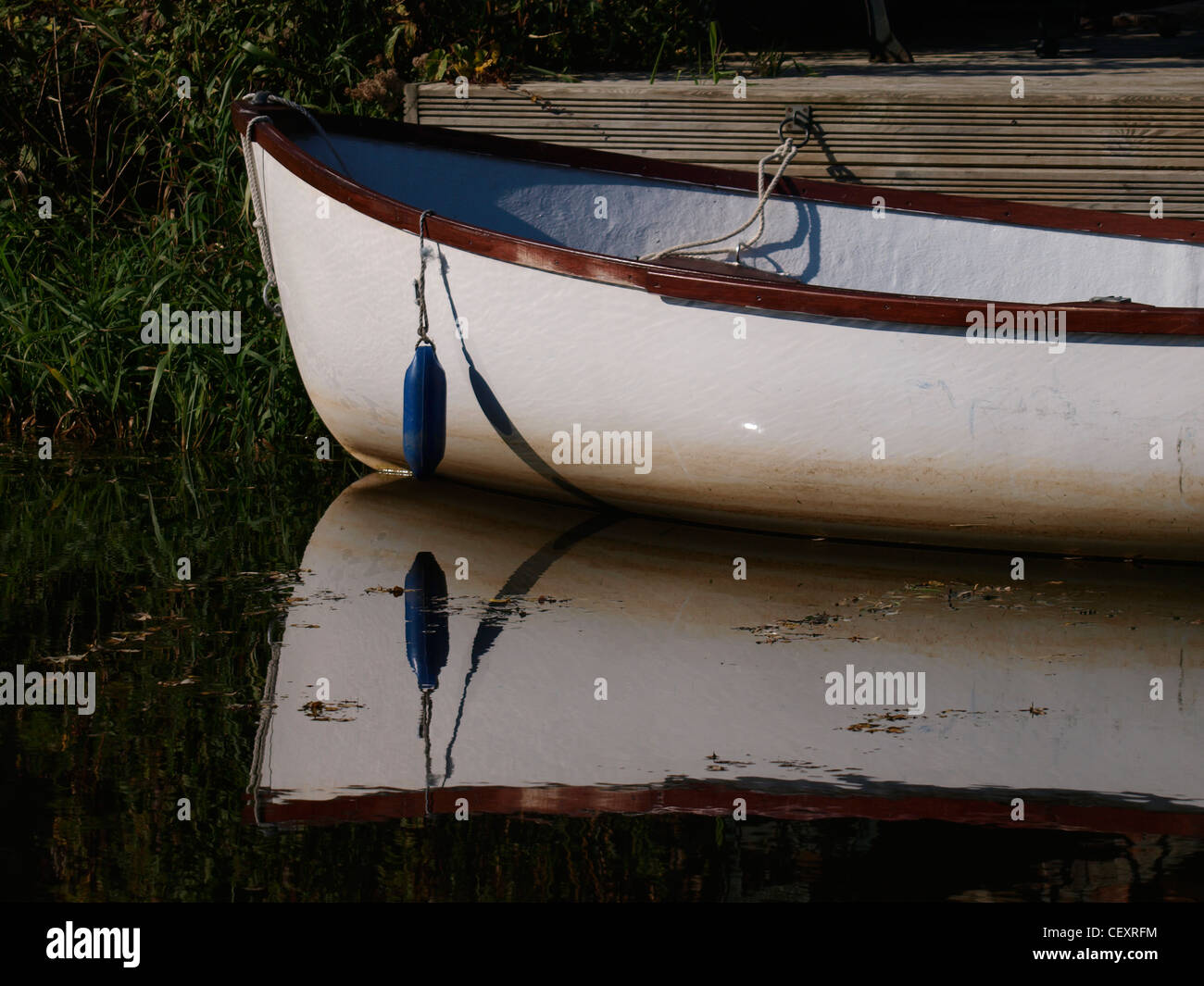 Rowing boat and reflection, Bude, Cornwall, UK Stock Photo Alamy