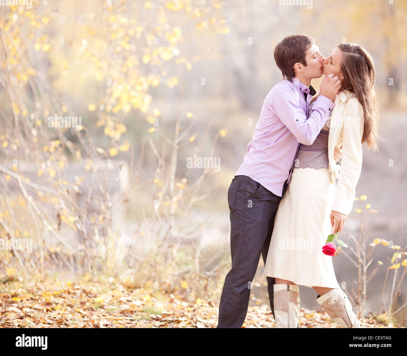 happy young couple in the park Stock Photo - Alamy