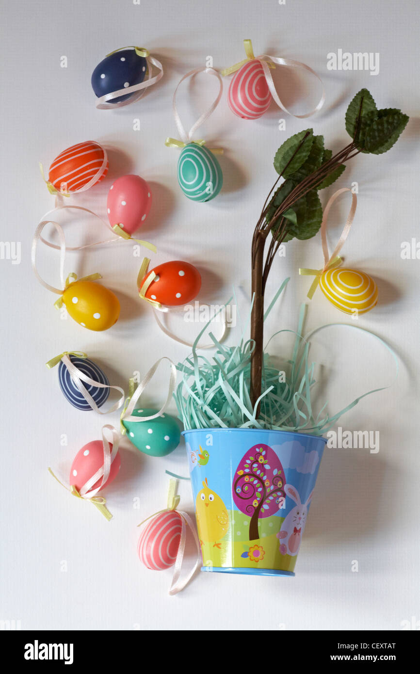 Easter egg tree with Easter bucket with chick and bunny rabbit on isolated on white background Stock Photo