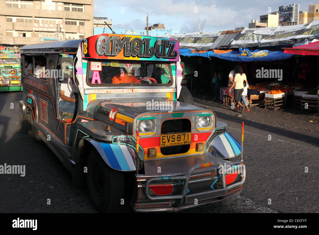 Colorful jeepney bus in the town center. Legaspi, Luzon, Albay, Bicol, Philippines, South-East Asia, Asia Stock Photo