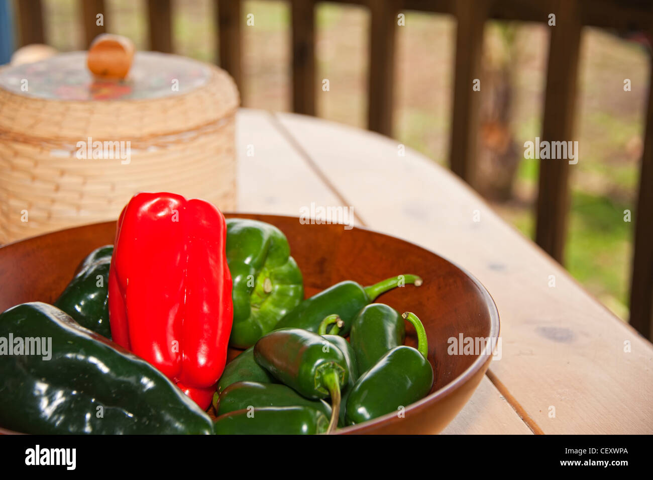 Red and green bell peppers - Poblano and Jalapeno peppers Stock Photo