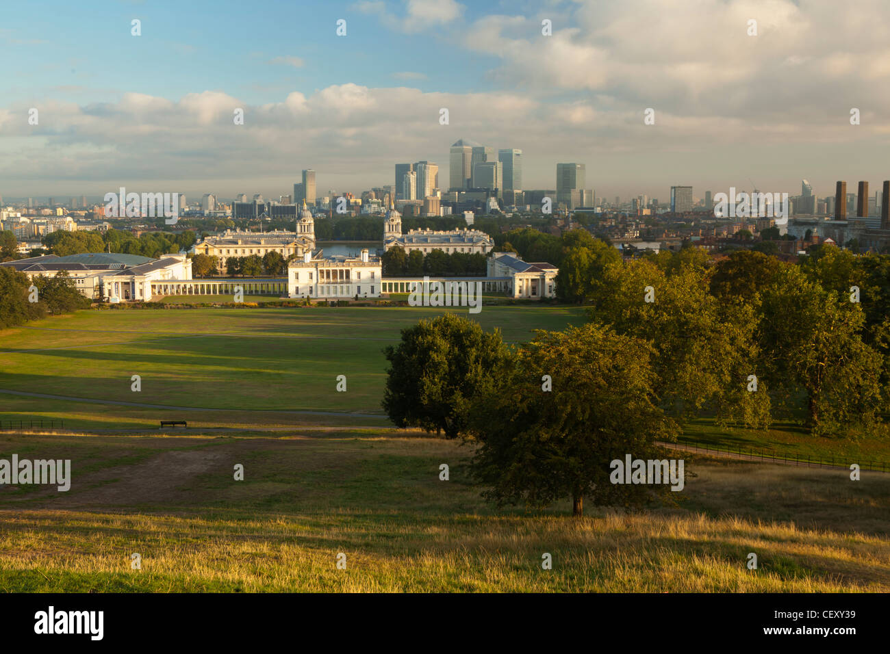 A view of Canary Wharf and the City of London from Greenwich Park and the Royal Obervatory Stock Photo