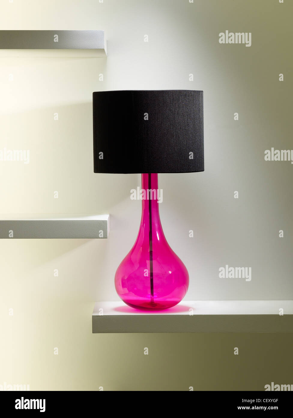 A still life shot of a table lamp on a shelf Stock Photo