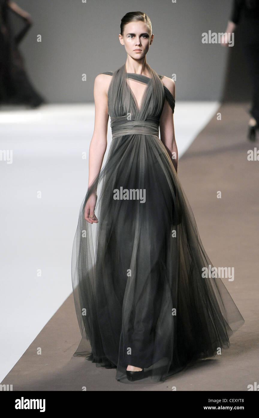 Elie Saab Paris Ready to Wear Autumn Winter Grey tie and dye halterneck  ankle length tulle dress and black shoes Stock Photo - Alamy