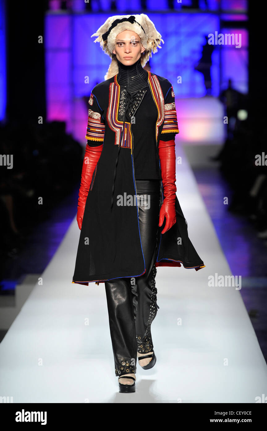 Jean Paul Gaultier Paris Ready to Wear Autumn Winter Patterned black dress,  long red leather gloves, black studded leather Stock Photo - Alamy