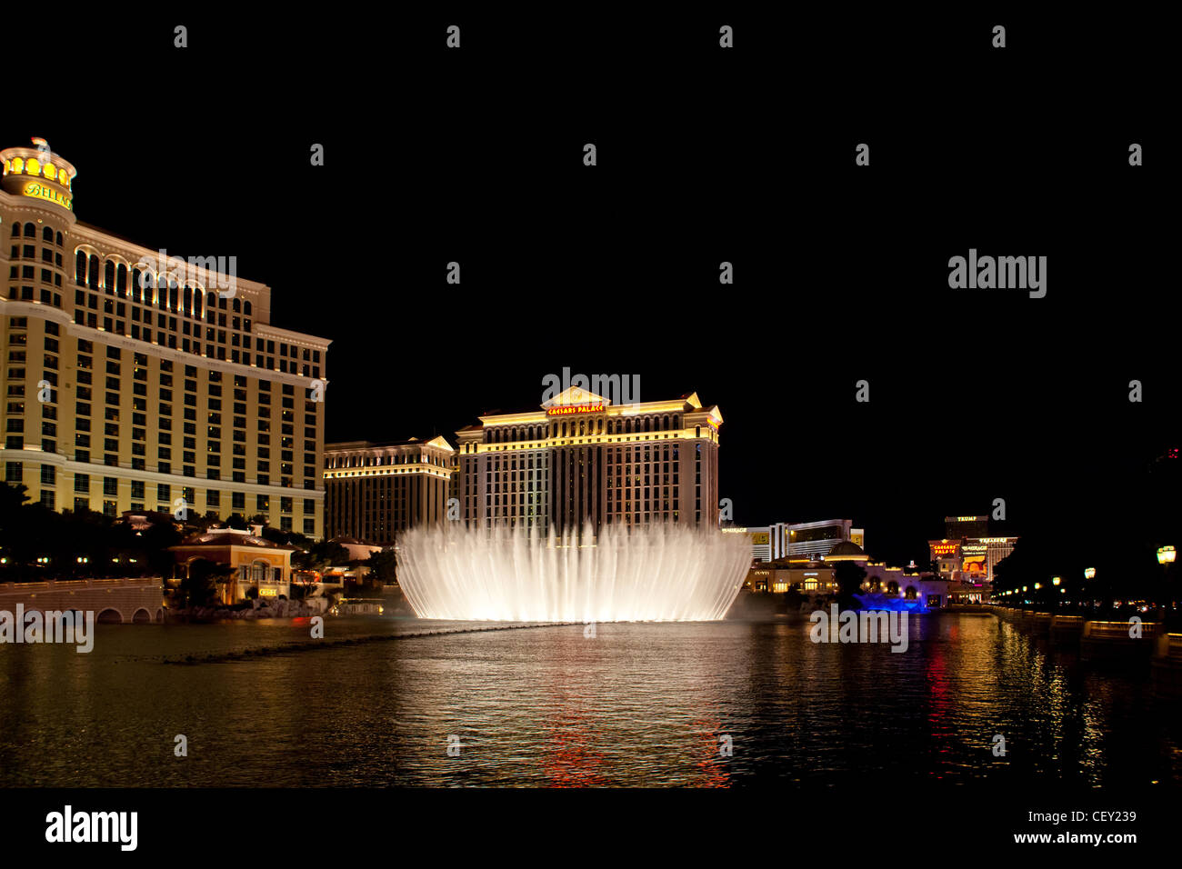 The Water Lightshow at the Bellagio in Las Vegas Nevada with Caesars Palace and the Strip in the Background Stock Photo