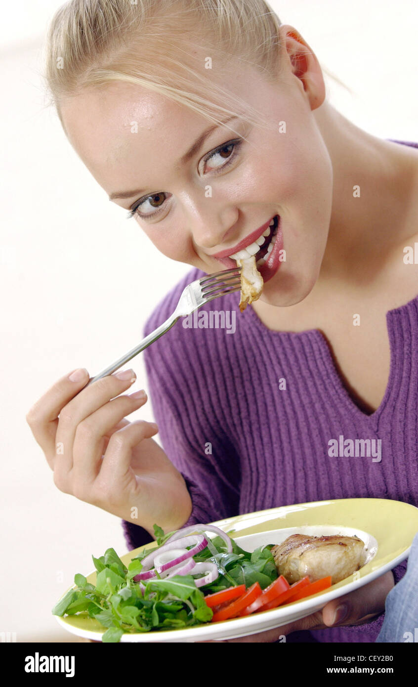 Female Blonde Hair Up Off Face Strands Of Fringe On Forehead