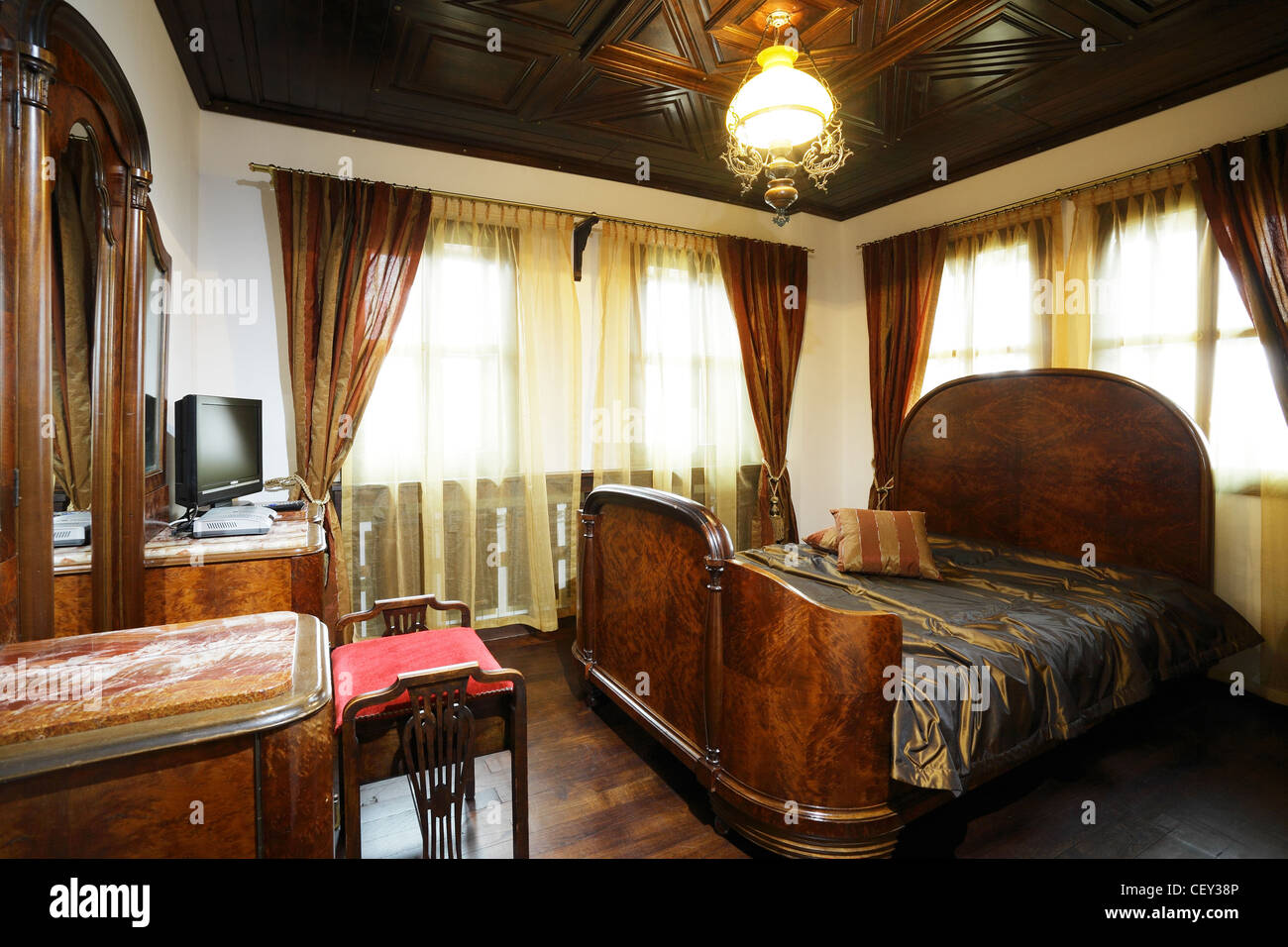 Interior Hotel Bedroom With Medieval Wooden Furniture Stock Photo Alamy