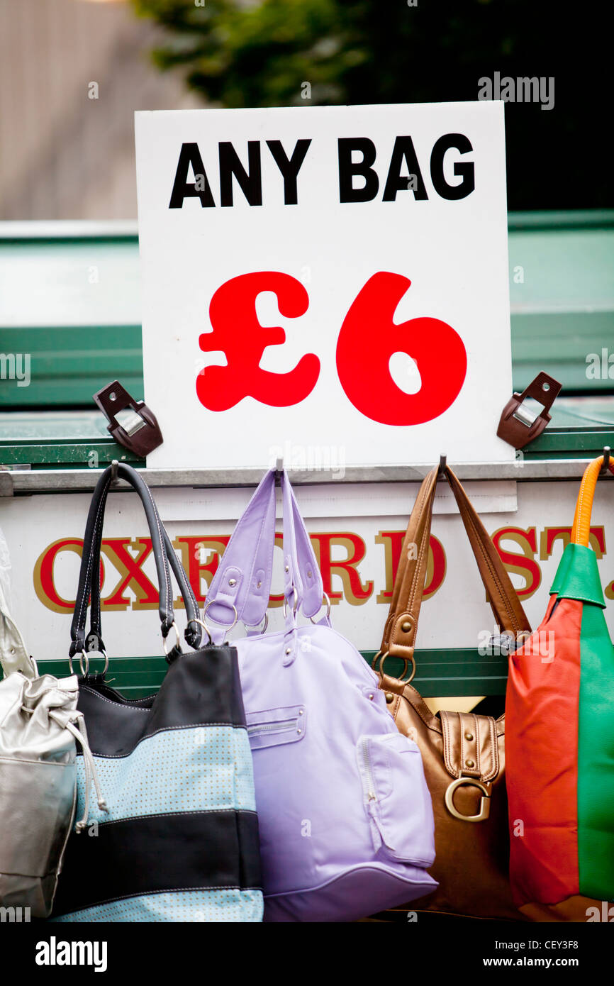 Handbags for sale from a street stand on Oxford Street Stock Photo