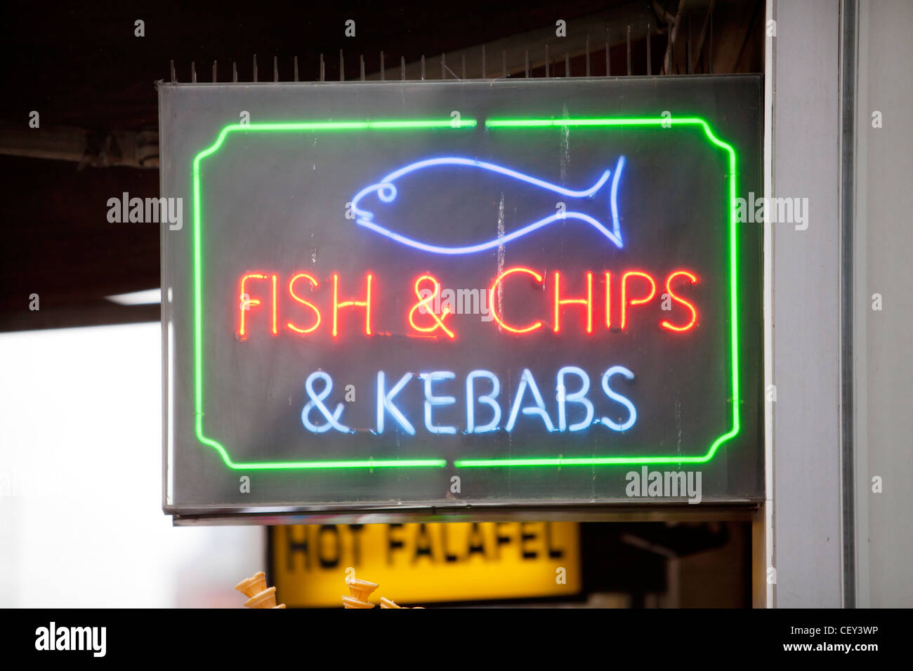 A neon sign for fish and chips and kebabs on Oxford Street Stock Photo