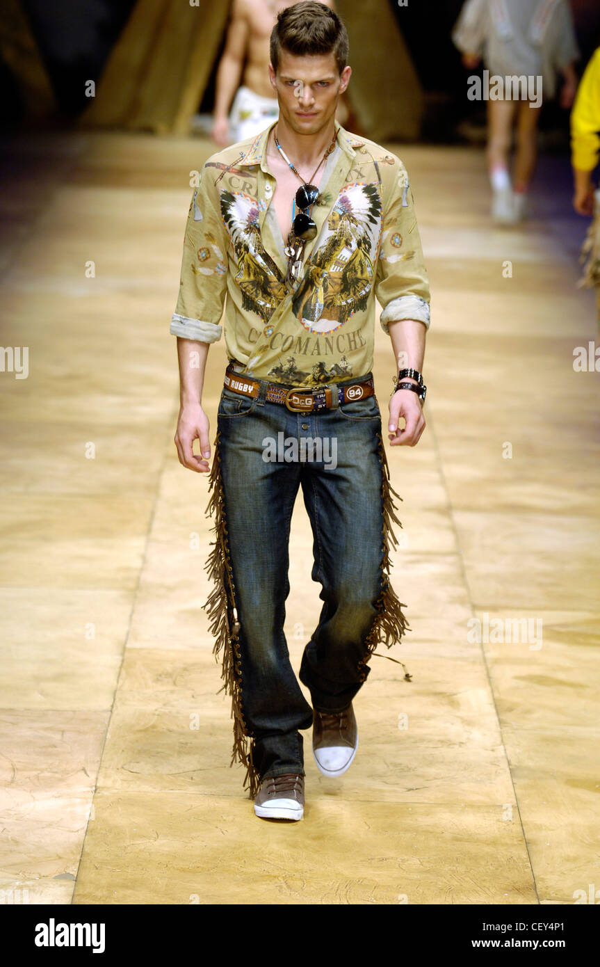 Dolce & Gabbana Milan Ready to Wear Menswear Spring Summer Brunette male  model walking on the runway wearing a a brown button Stock Photo - Alamy