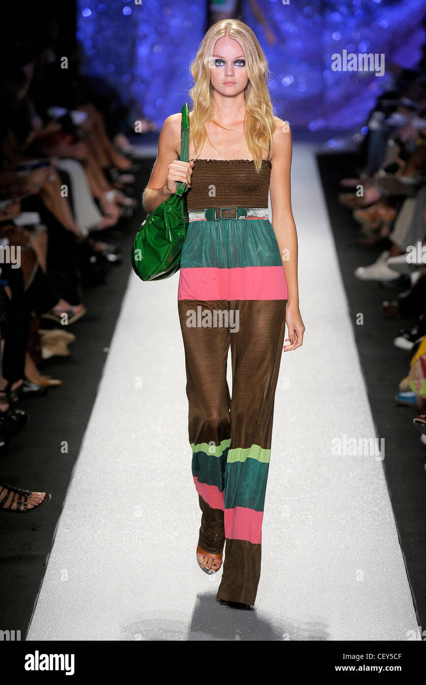 Miss Sixty New York Ready to Wear Spring Summer Model wearing a brown  striped jumpsuit smocked bandeau top, elasticated belt Stock Photo - Alamy