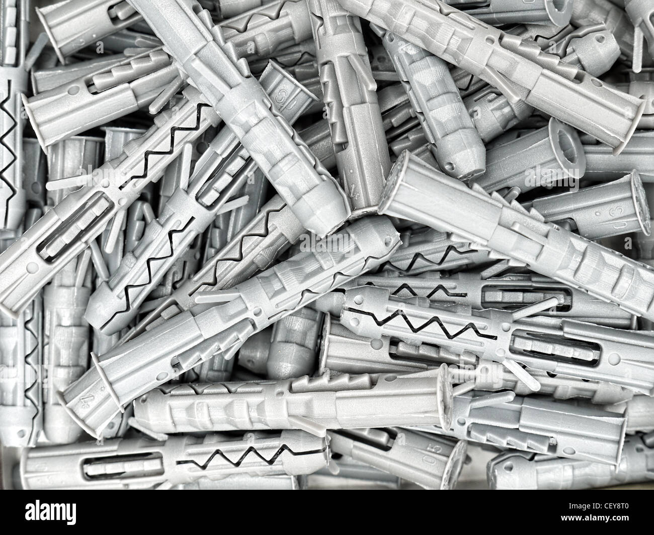 Background of gray plastic dowels shot from above Stock Photo