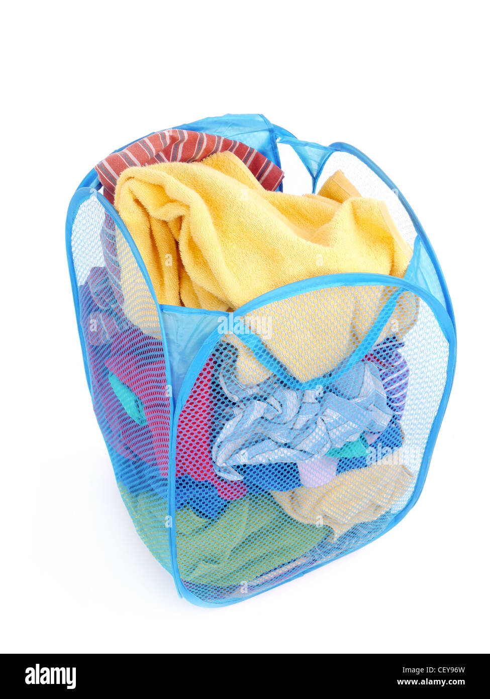 Dirty clothes in blue woven laundry basket on white background Stock Photo