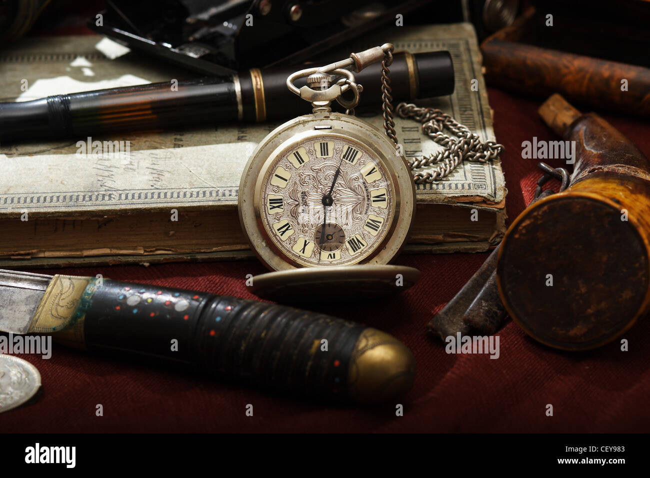 An old watch close-up wit other old stuff Stock Photo