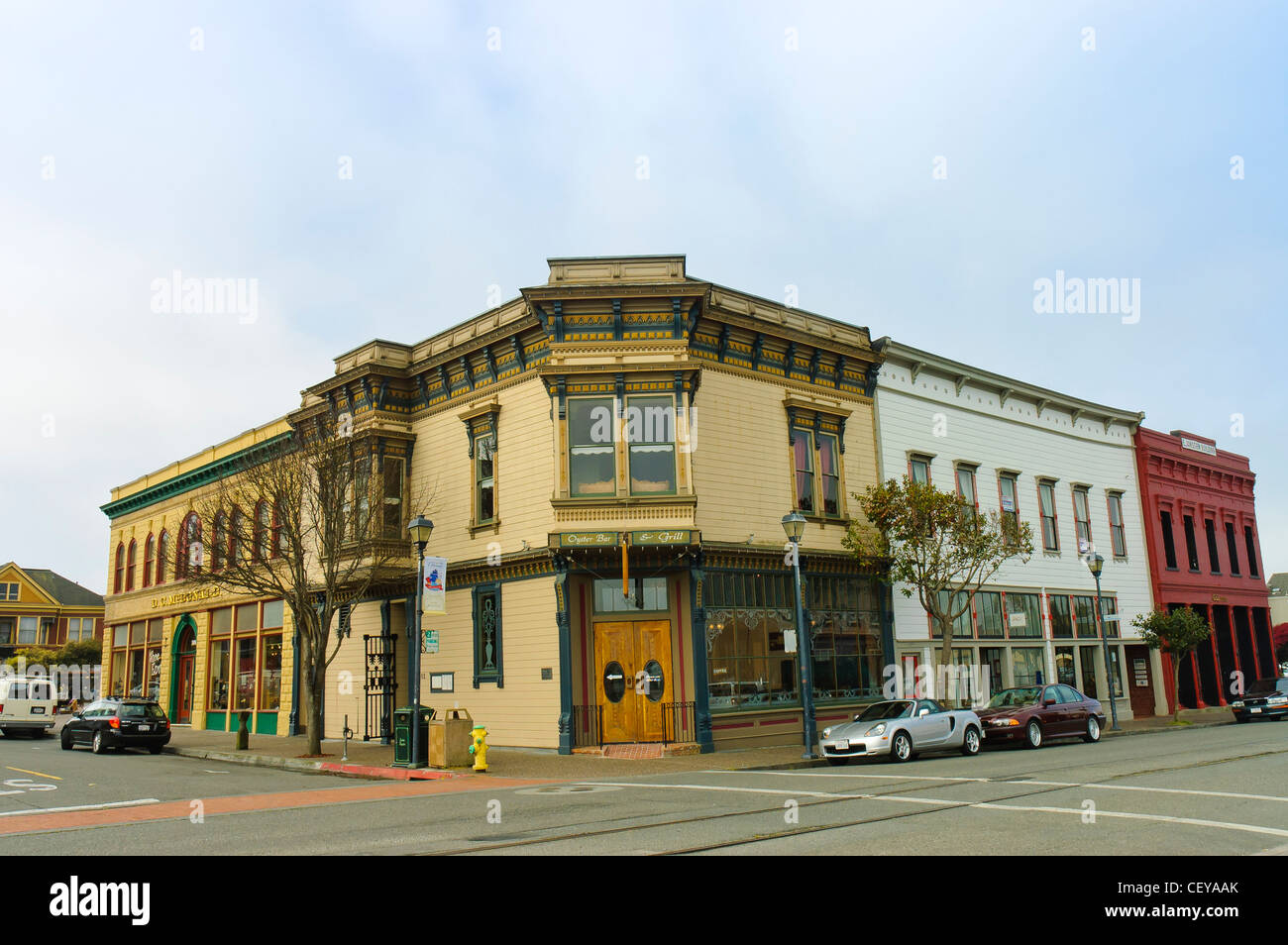 street scene with view of typical Victorian style yellow store  in Arcata, Humboldt county, California, Stock Photo