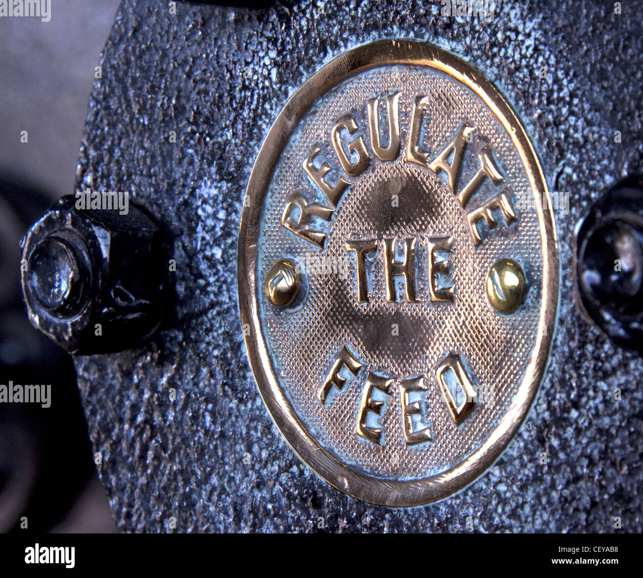 Regulate The Feed, sign from a canal dock steam engine Stock Photo