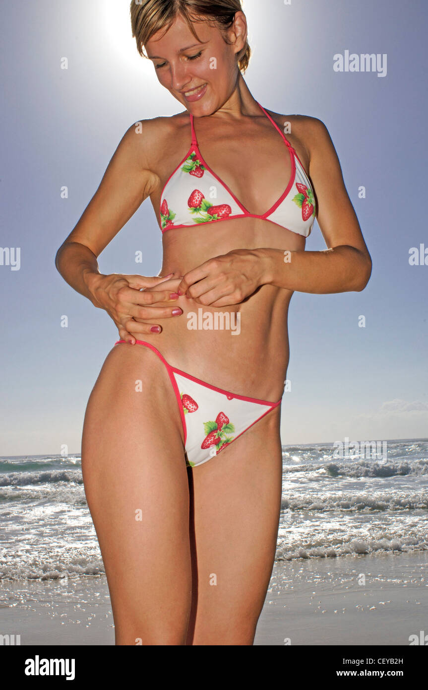 Female Short Blonde Hair White Bikini With Red Edging