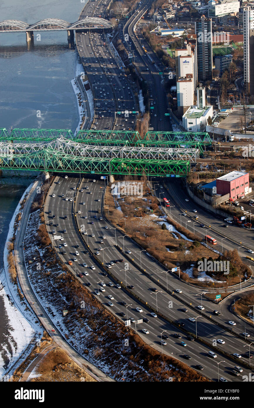 The Hangang railway bridge over the River Han and road in Seoul, South Korea Stock Photo