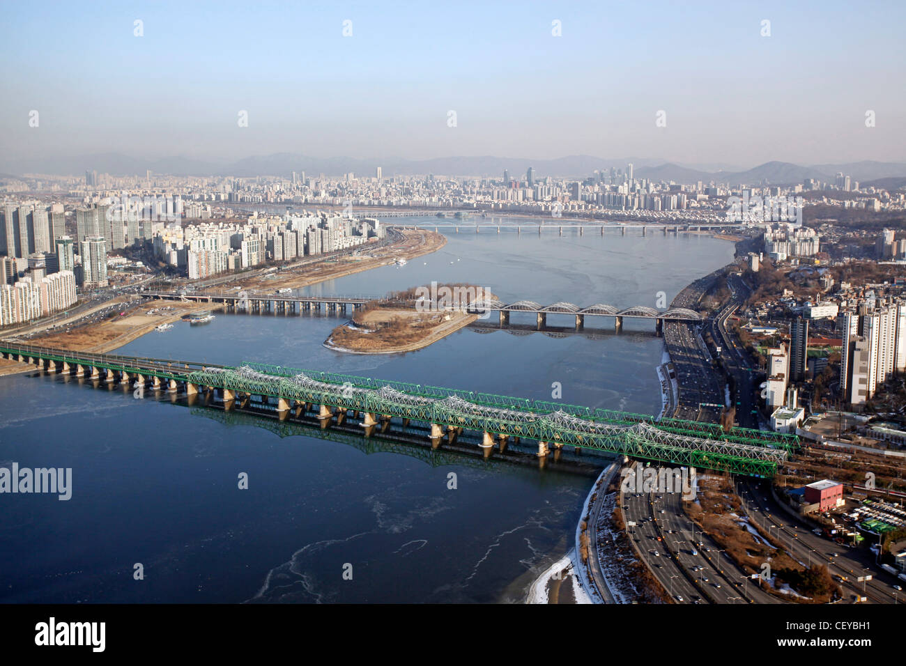 The Han River and bridges with the city skyline in Seoul, South Korea Stock Photo