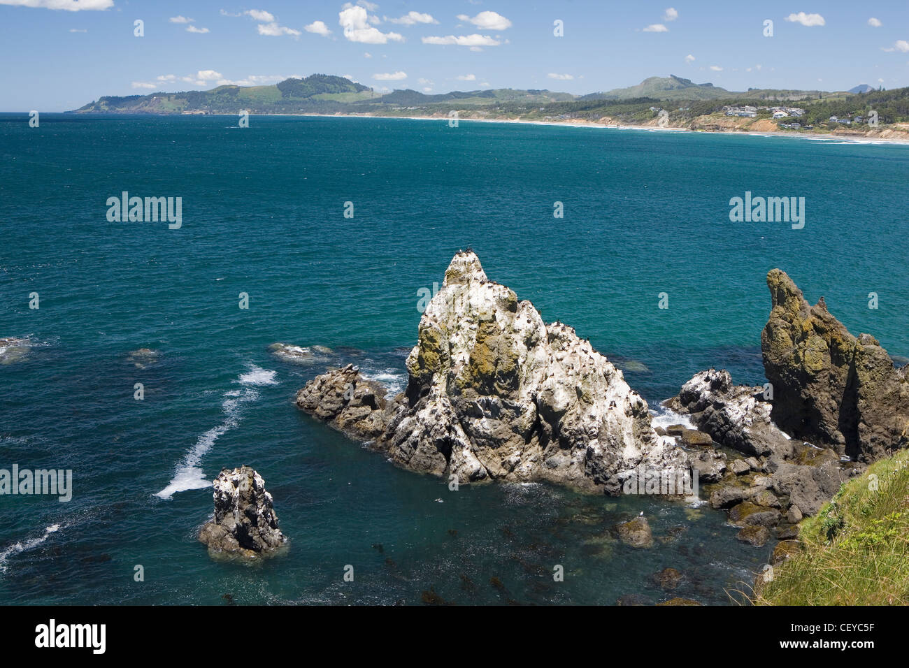 rock formation in the blue water along the coast at cape foulweather; oregon united states of america Stock Photo