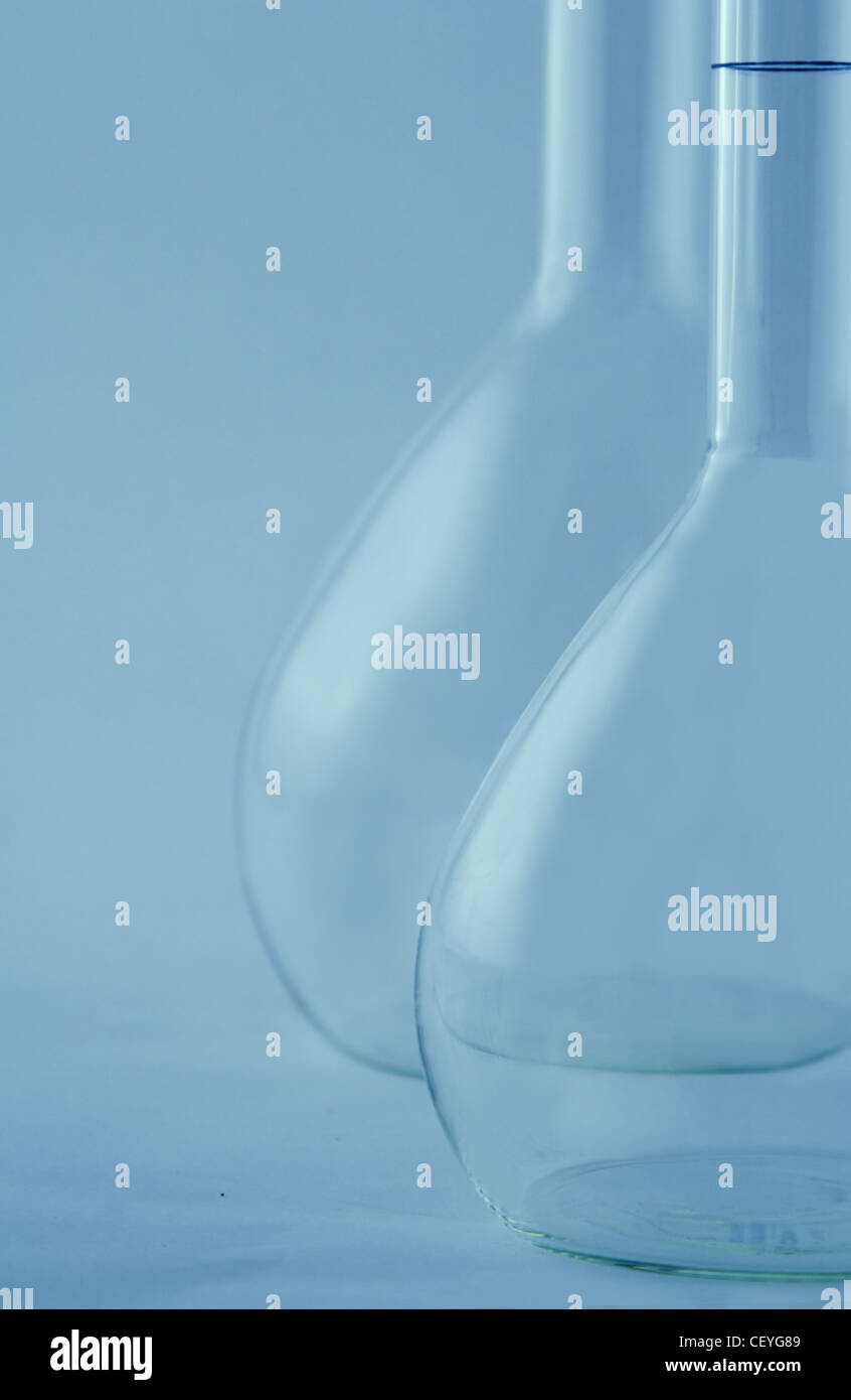 Laboratory flask in a blue environment Stock Photo Alamy